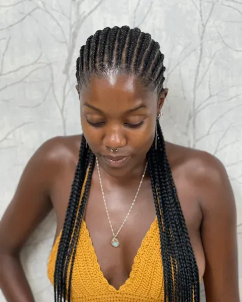 Long braids parted straight back